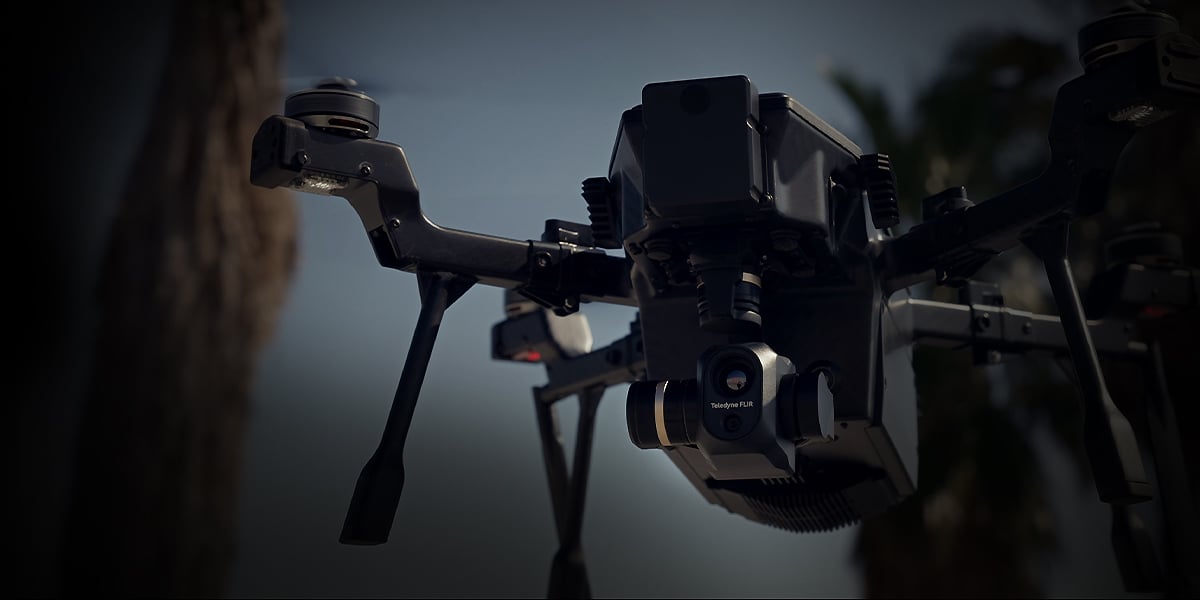 SIRAS drone flying near trees